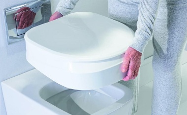 Ergonomisch konturierte Toilettensitzerhöhung