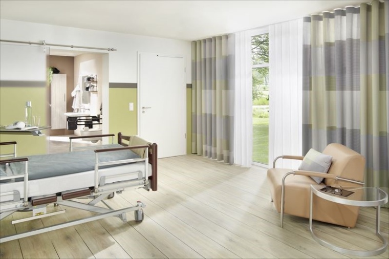 Drapilux 189 85 in Grau und Currygelb lässt das Pflegezimmer freundlicher...