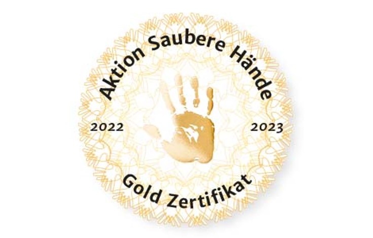Das Gold-Logo der Aktion Saubere Hände Foto: UMM